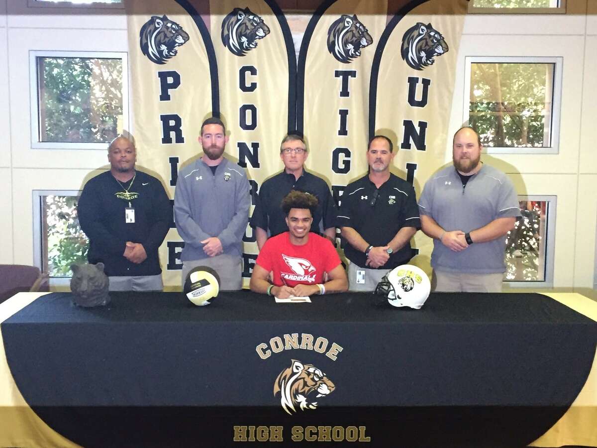 Colby Kizzie signed with Trinity Valley Community College during a ceremony at Conroe High School in April.