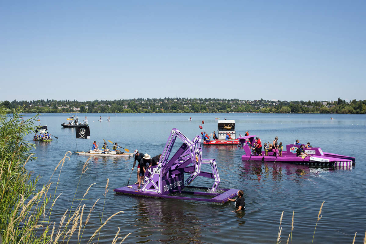 A menagerie of cardboard, wood and milk carton boats strut their stuff one last time during Seafair's annual Milk Carton Derby on Green Lake, Saturday, July 15, 2017.