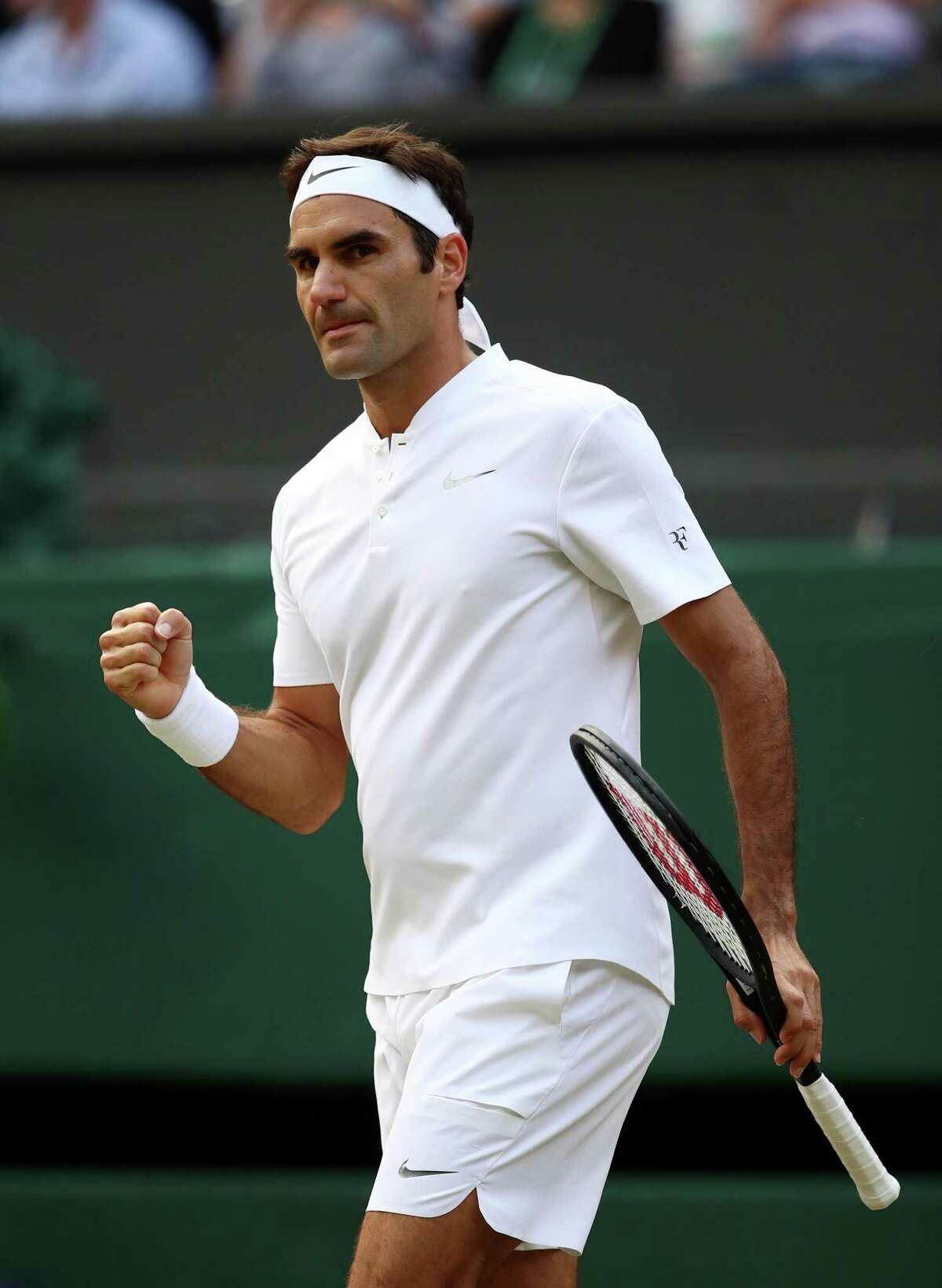 LONDON, ENGLAND - JULY 14: Roger Federer of Switzerland celebrates during the Gentlemen's Singles semi final match against Tomas Berdych of The Czech Republic on day eleven of the Wimbledon Lawn Tennis Championships at the All England Lawn Tennis and Croquet Club at Wimbledon at Wimbledon on July 14, 2017 in London, England. (Photo by Julian Finney/Getty Images)