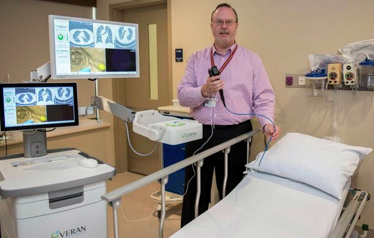 Brian Kinney, respiratory care and sleep disorders manager at MidMichigan Health, demonstrates the 3-D mapping capabilities of the SPiN Thoracic Navigation System. (Photo provided)