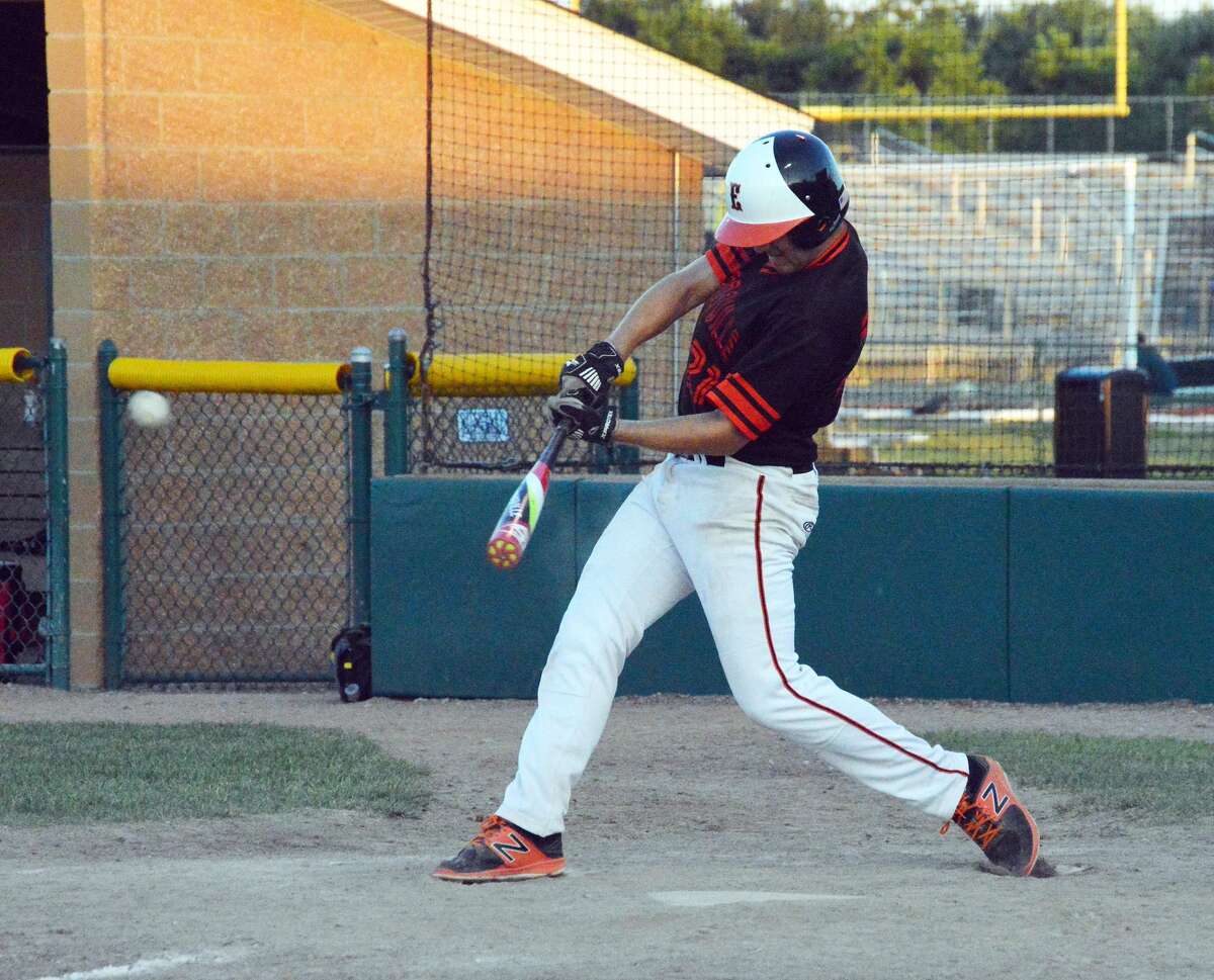 Edwardsville first baseman Tyler Holt smokes a double into left in Saturday’s game against the STL Prospects Black.