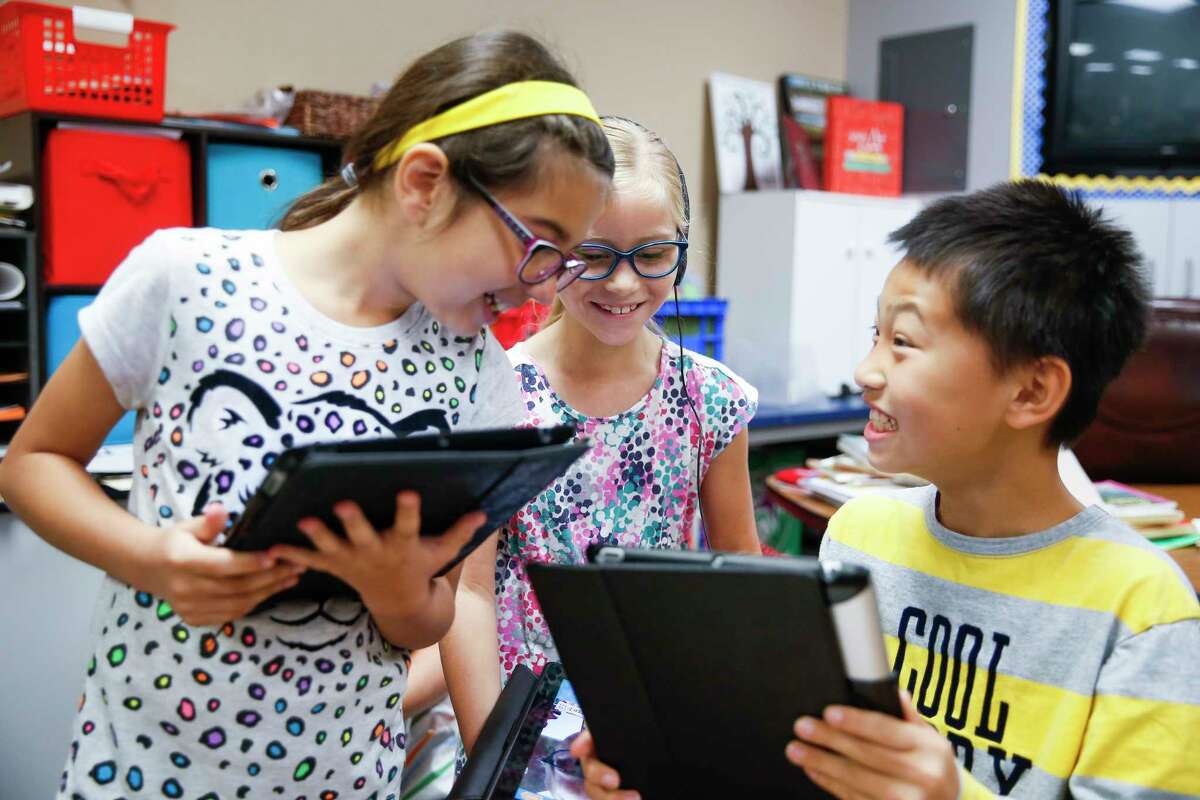 Woodlands public schools rank high in school report