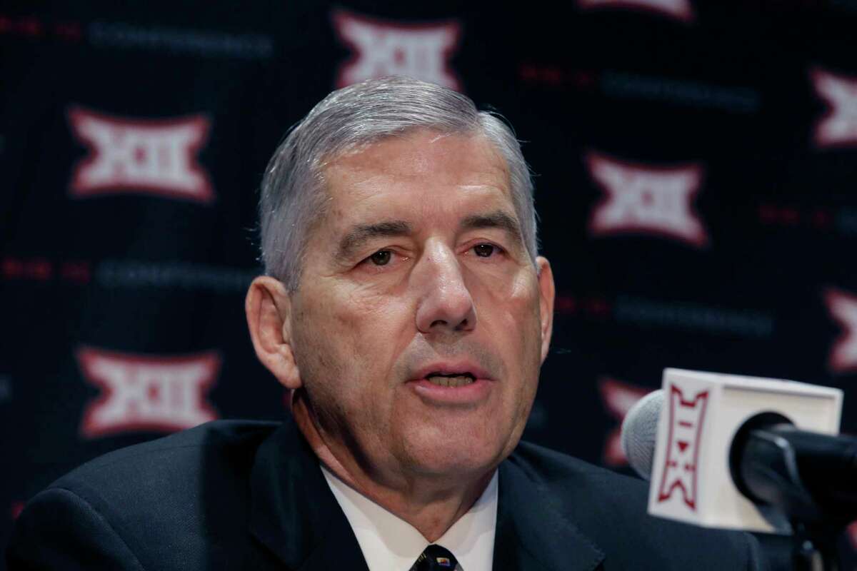 In this Oct. 17, 2016, file photo, Big 12 Commissioner Bob Bowlsby speaks to reporters after The Big 12 Conference meeting in Grapevine, Texas. When the Big 12 kicks off its football media days on Monday, commissioner Bob Bowlsby will be able to tout a winning record in bowl games last season and the still-growing revenue for the leagueÂ?’s 10 schools. What the league really needs this season is to get a team into the College Football Playoff.