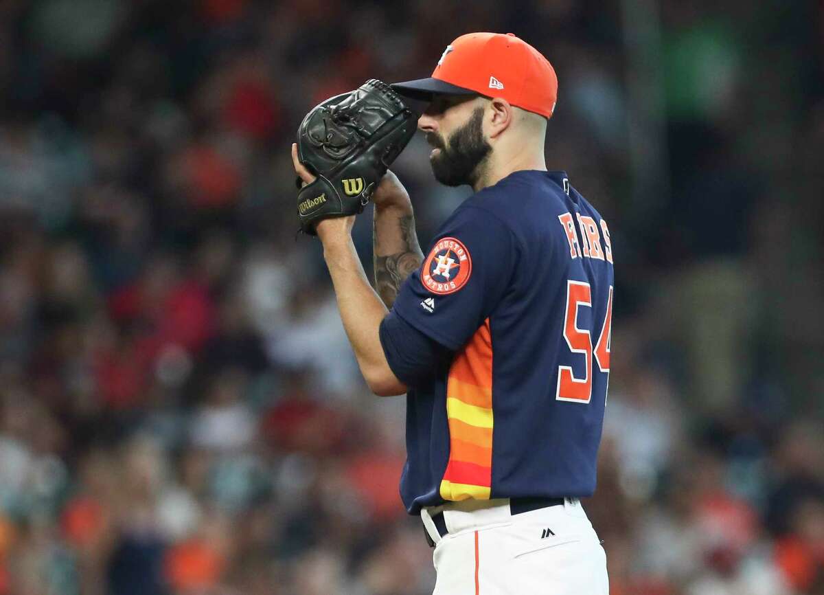 Houston Astros starting pitcher Mike Fiers (54) pitches during the top fifth inning of the game at Minute Maid Park Sunday in Houston.