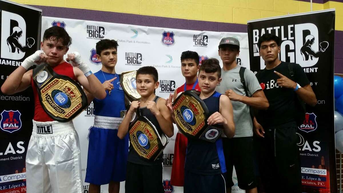 From left, Austin Alvarado, Emilio Garcia, Roy Garcia and Jose Luis Martinez from Baby Joey?’s Boxing Club all won titles Sunday at the Battle in Big D.