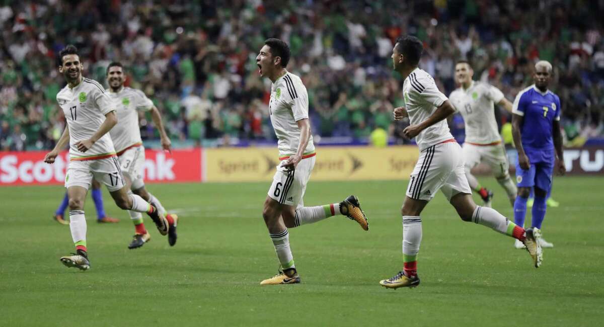 Mexico defeated Curacao 2-0 during a CONCACAF Gold Cup soccer match in San Antonio on Sunday.