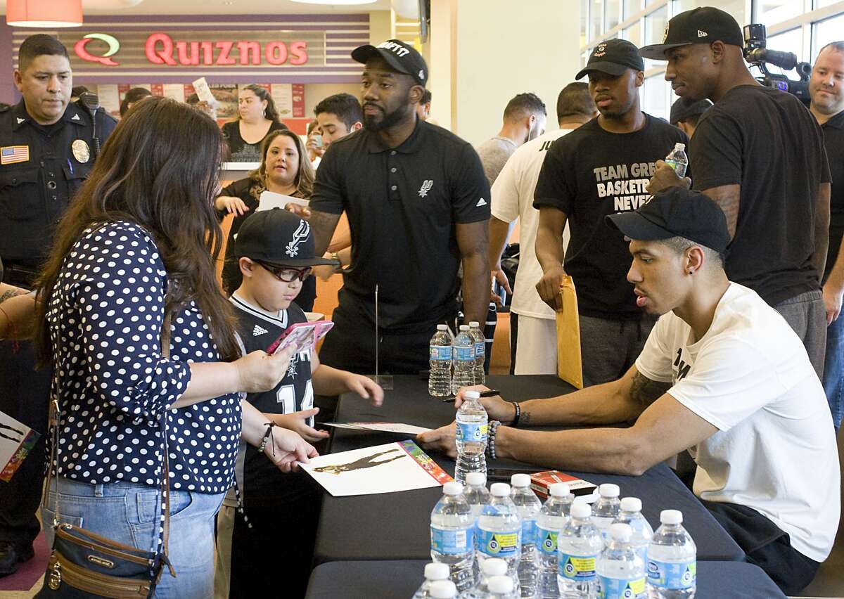 Fans gathered at The Outlet Shoppes to take pictures with and get autographs from Spurs guard Danny Green on Friday, July 14.
