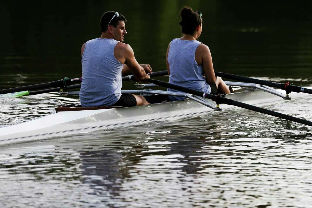 Buffalo Bayou Rowing Center founder Greg Wood and his wife, Michaela Wood, row along Buffalo Bayou at Tony Marron Park Friday, June 30, 2017 in Houston. Wood started the non-profit to build a rowing program for inner city kids in Houston on Buffalo Bayou but needs a boathouse to make the venture a reality. ( Michael Ciaglo / Houston Chronicle )