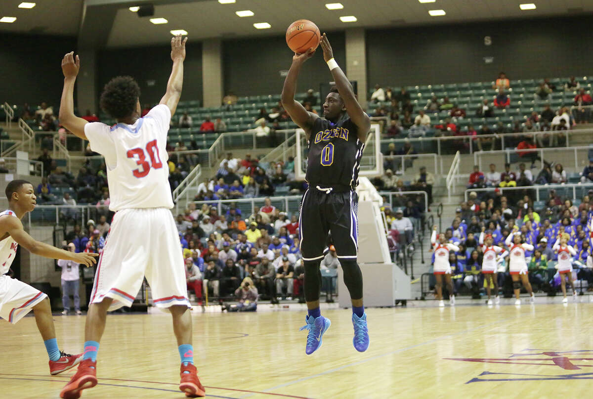 Ozen's Jordan Hunter, No. 0, attempts a shot during the Class 5A Region III Semifinal against Madison Friday in the Merrell Center in Katy, TX. (Matt Billiot / Special to the Enterprise)