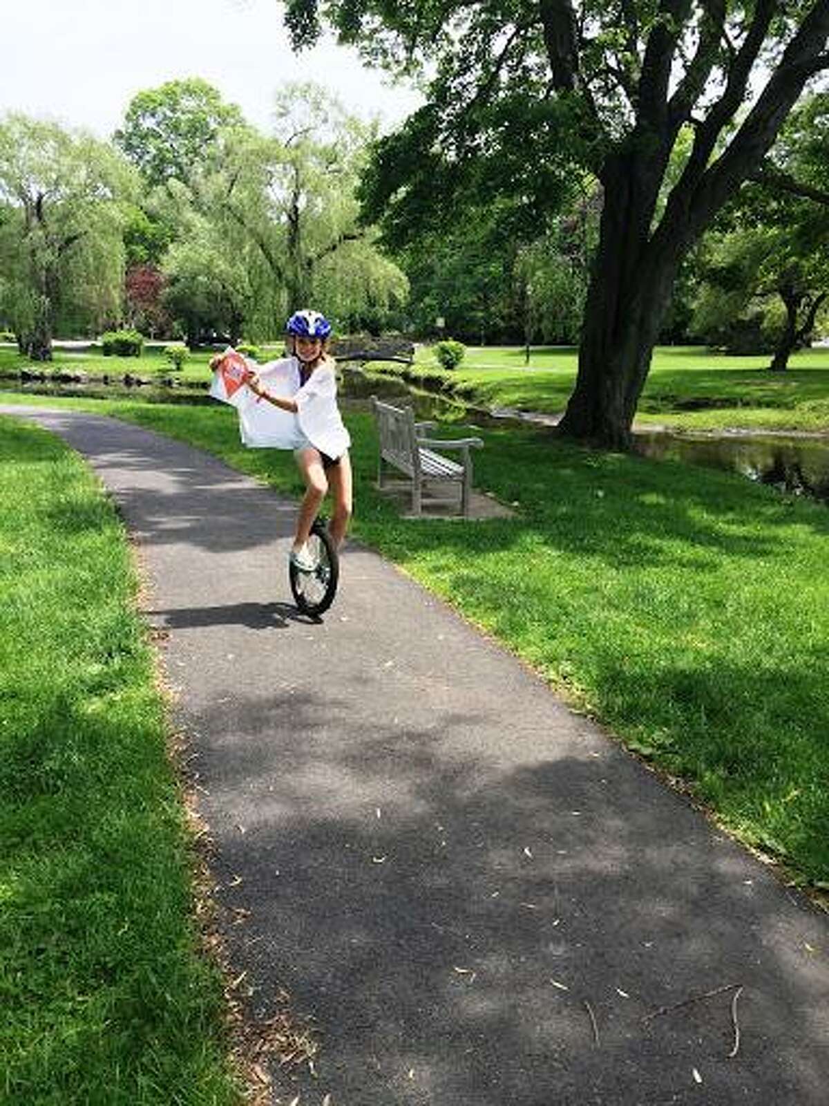 Photo submitted to the Greenwich Historical Society 2017 “This Place Matters!” contest: Binney Park, Old Greenwich, We love to come here and practice unicycling, walk the dog, ride our bikes down for a picnic, and we love the fireworks every year for the 4th of July! Ava Wallack