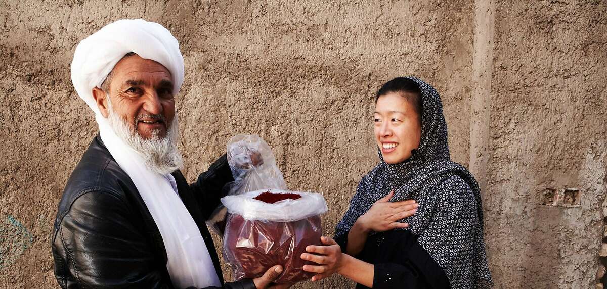 Afghan saffron farmer and Kimberly Jung