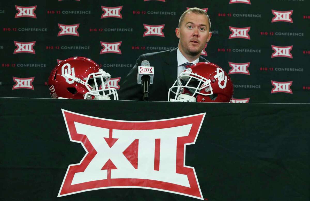 Oklahoma head coach Lincoln Riley takes his seat on the dais before speaking to reporters during the Big 12 NCAA college football media day in Frisco, Texas, Monday, July 17, 2017. (AP Photo/LM Otero)