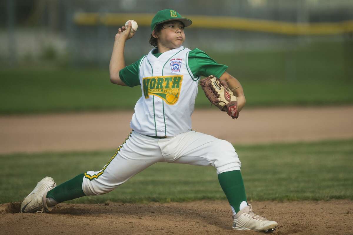 North Saginaw Township's Connor Krausneck pitches the ball during his team's sectional championship game against Midland on Monday in Saginaw.