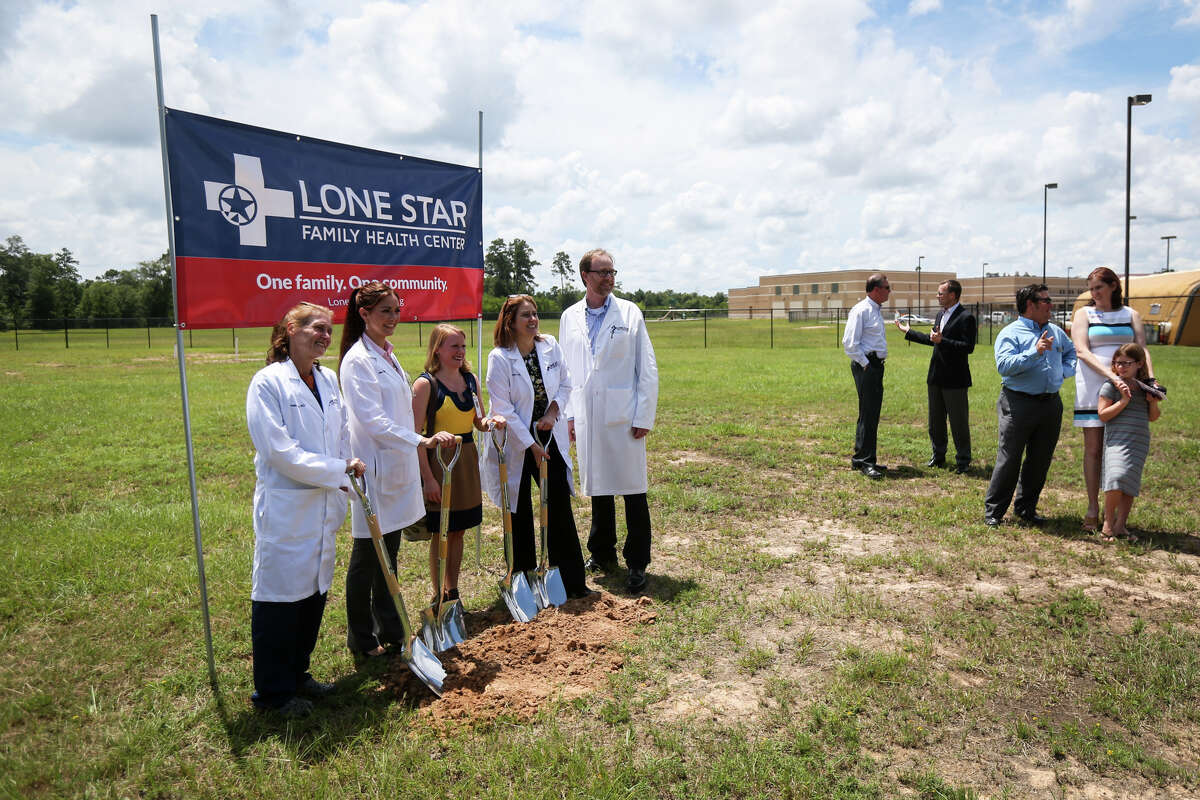 Lone Star Family Health Center doctors pose for a photo during the groundbreaking for a Lone Star Family Health Center clinic on Monday, July 17, 2017, on the campus of Ben Milam Elementary School in Grangerland.
