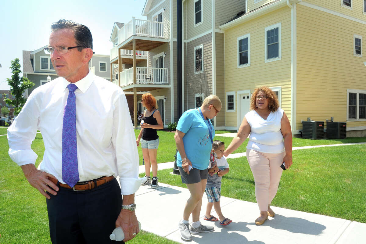 FILE: Governor Dannel Malloy attends at a ceremony marking the opening of Crescent Crossing, a new affordable housing development in Bridgeport, Conn. July 18, 2017.