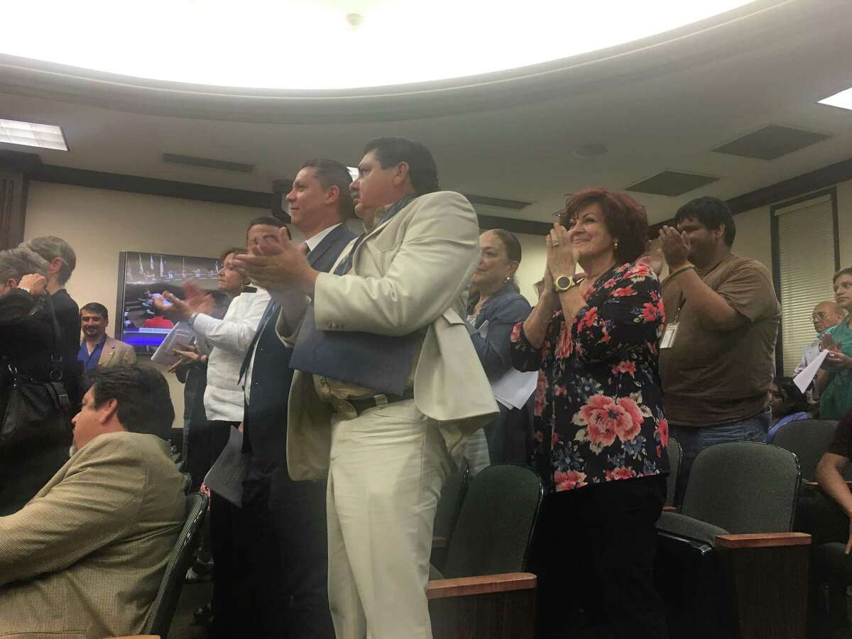 Those who attended the Laredo City Council meeting on Monday gave a standing ovation after it voted to join the lawsuit against Senate Bill 4.