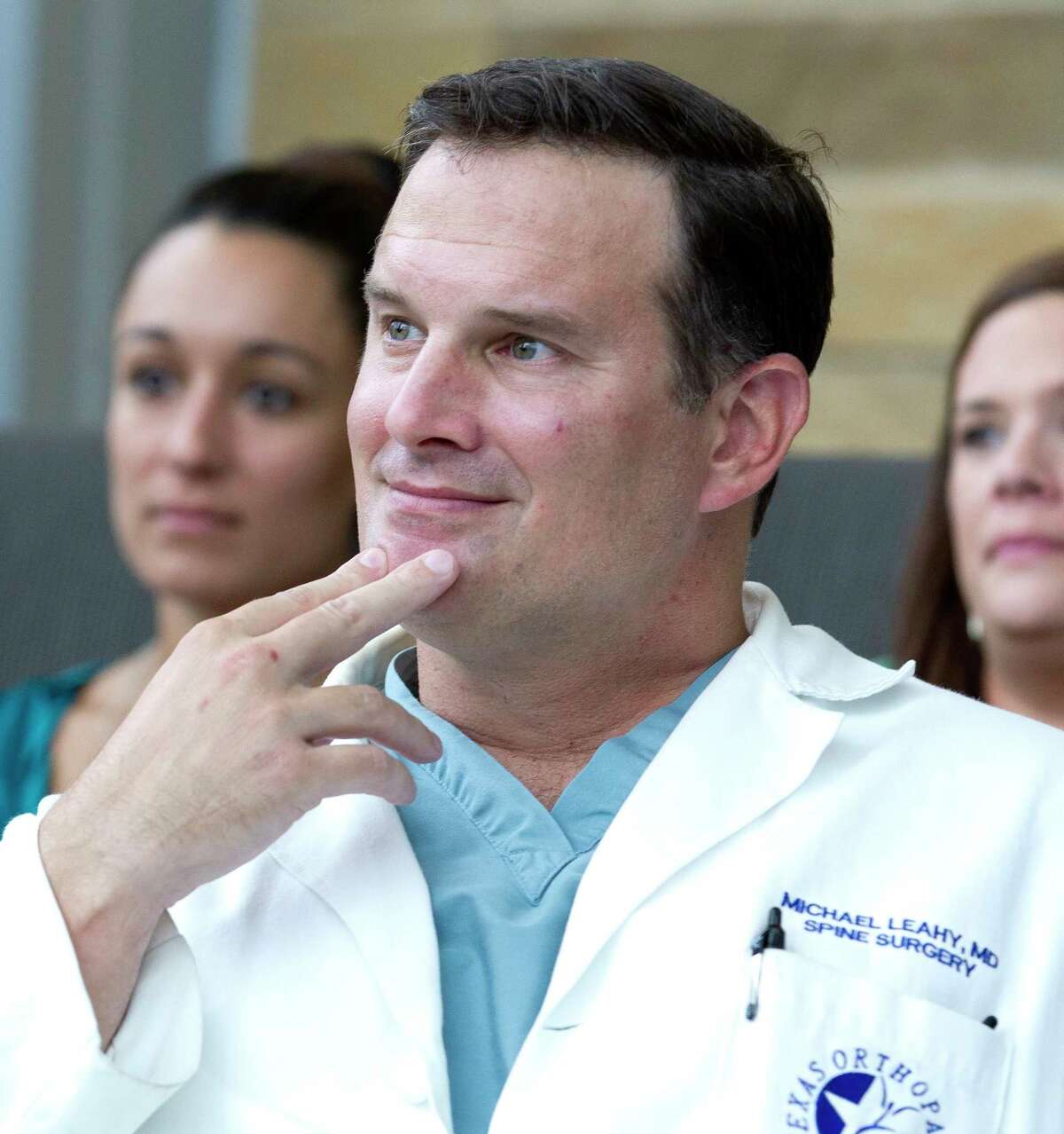 Doctor Mike Leahy, a local spine surgeon, is seen during a reception with friends, family and hospital staff at CHI St. LukeÂ?’s Lakeside Hospital, Tuesday, July 18, 2017, in The Woodlands. Spinal Elements created a $125,000 endowment in honor of LeahyÂ?’s efforts through the company's Be a Hero program.