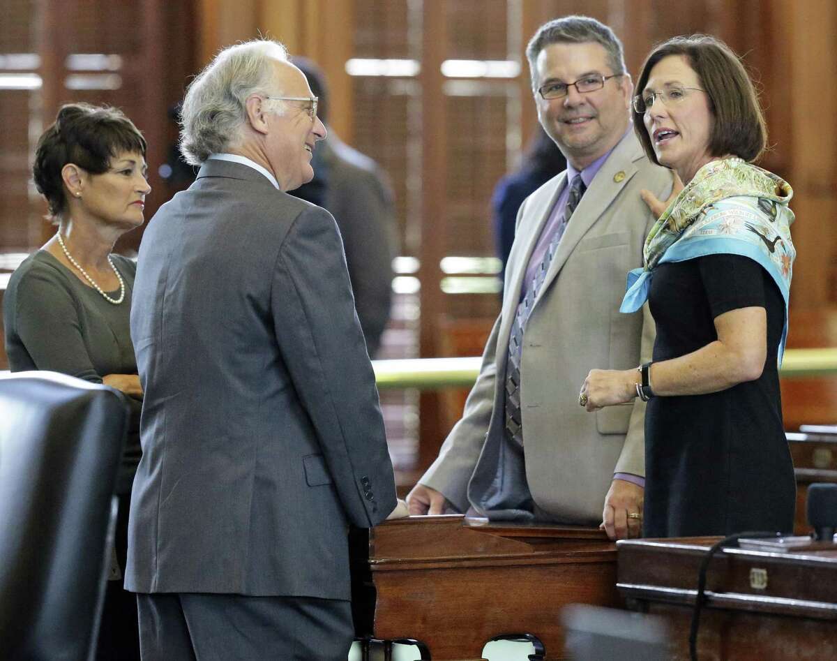 Sen. Lois Kolkhorst (right), original sponsor of the “bathroom bill,” chats with colleagues on the floor of the Senate on Thursday. From left are Sens. Donna Campbell, Kirk Watson and Charles Perry. The Texas Senate has set a public hearing for 9 a.m. Friday to hear from people about the newly filed Senate Bill 3, filed by Kolkhorst.