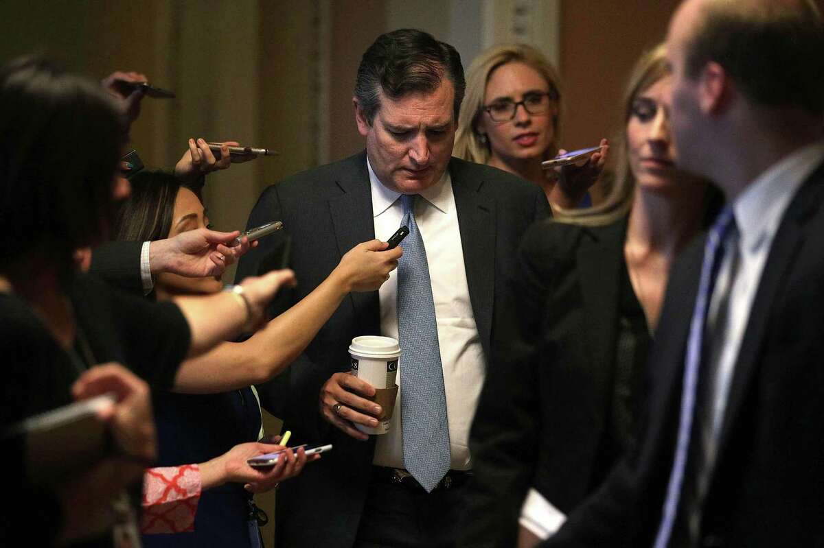 WASHINGTON, DC - JULY 13: U.S. Sen. Ted Cruz (R-TX) is surround by members of the media as he is on his way to view the details of a new health care bill July 13, 2017 at the Capitol in Washington, DC. Sen. McConnell will release a new Republican health care plan today. (Photo by Alex Wong/Getty Images)