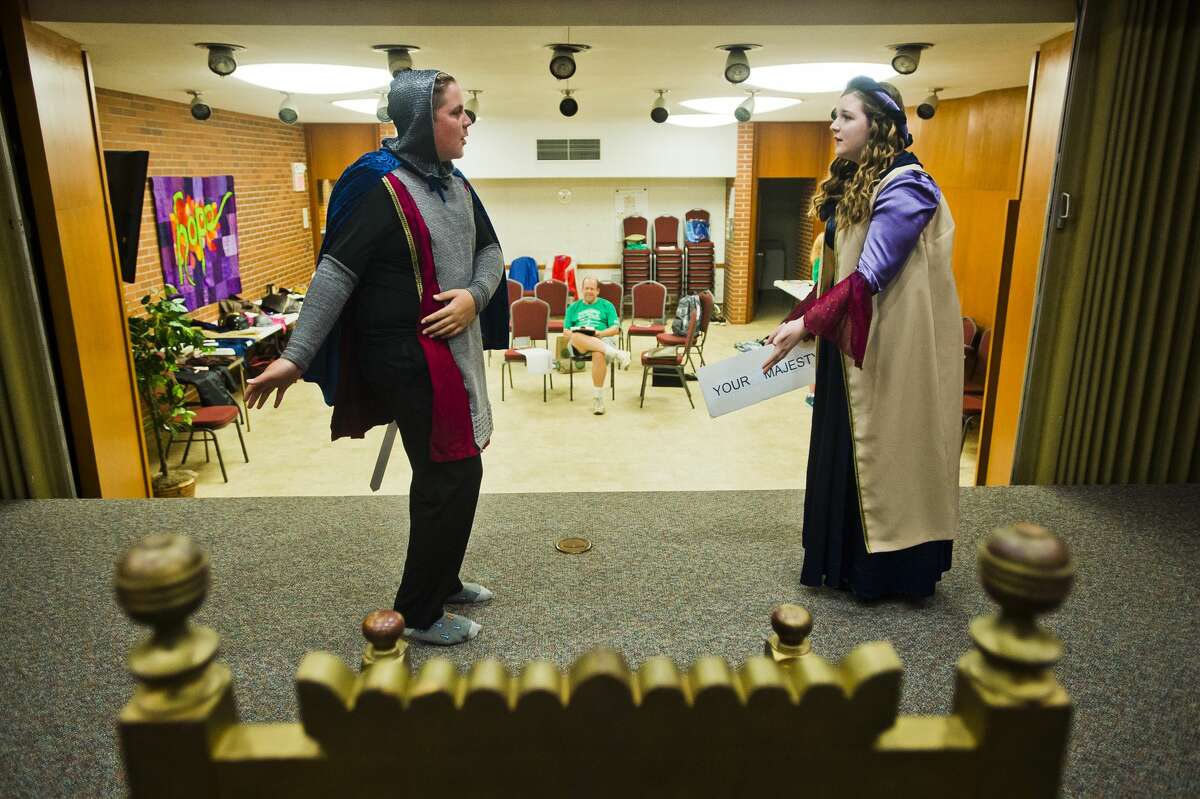 Brett Helmreich, left, and Kennedy Danner, right, rehearse Tuesday at First United Methodist Church in Midland for "Medieval Mélange," a variety show presented by Summer Stage Theatre, on Tuesday, July 13, 2017 at Midland First United Methodist Church.