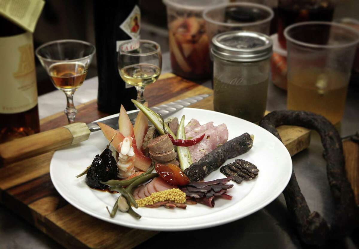 Michael Sohocki, chef and owner of Restaurant Gwendolyn, prepares a charcuterie plate. Tuesday, July 15, 2014.