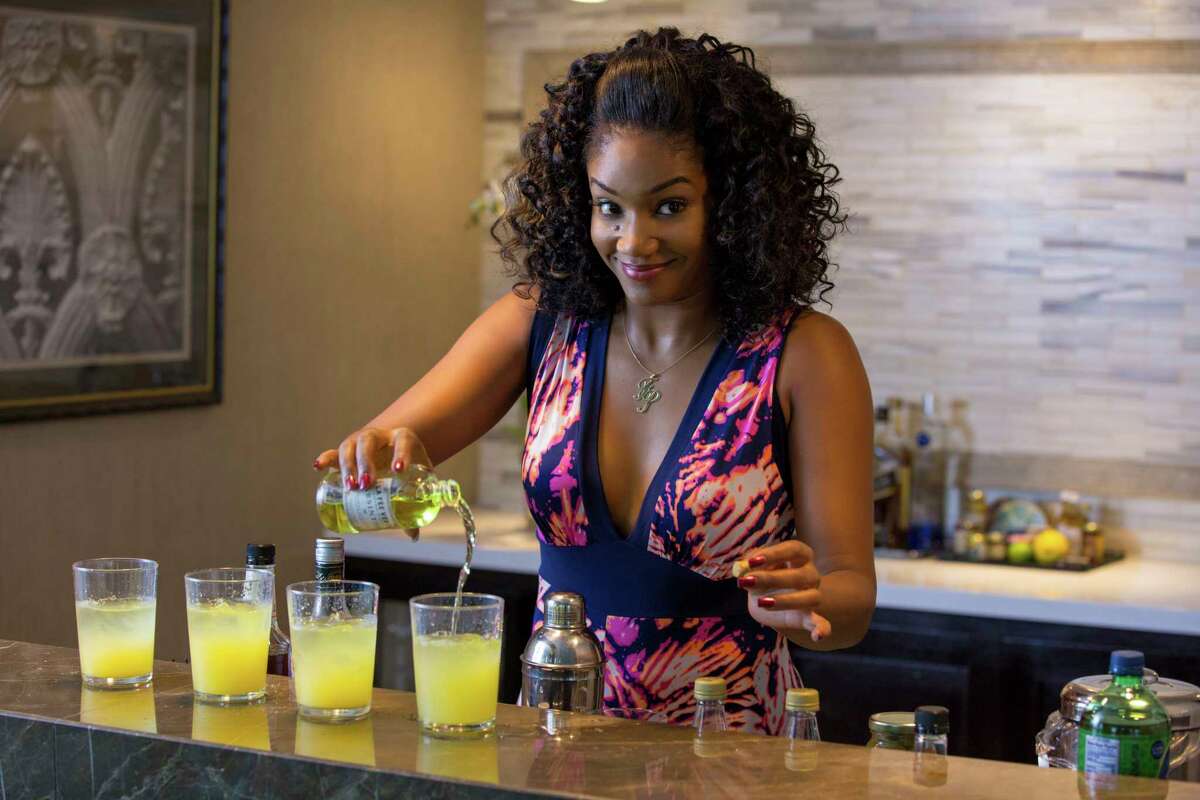 This image released by Universal Pictures shows Tiffany Haddish in a scene from the comedy "Girls Trip." (Michele K. Short/Universal Pictures via AP)
