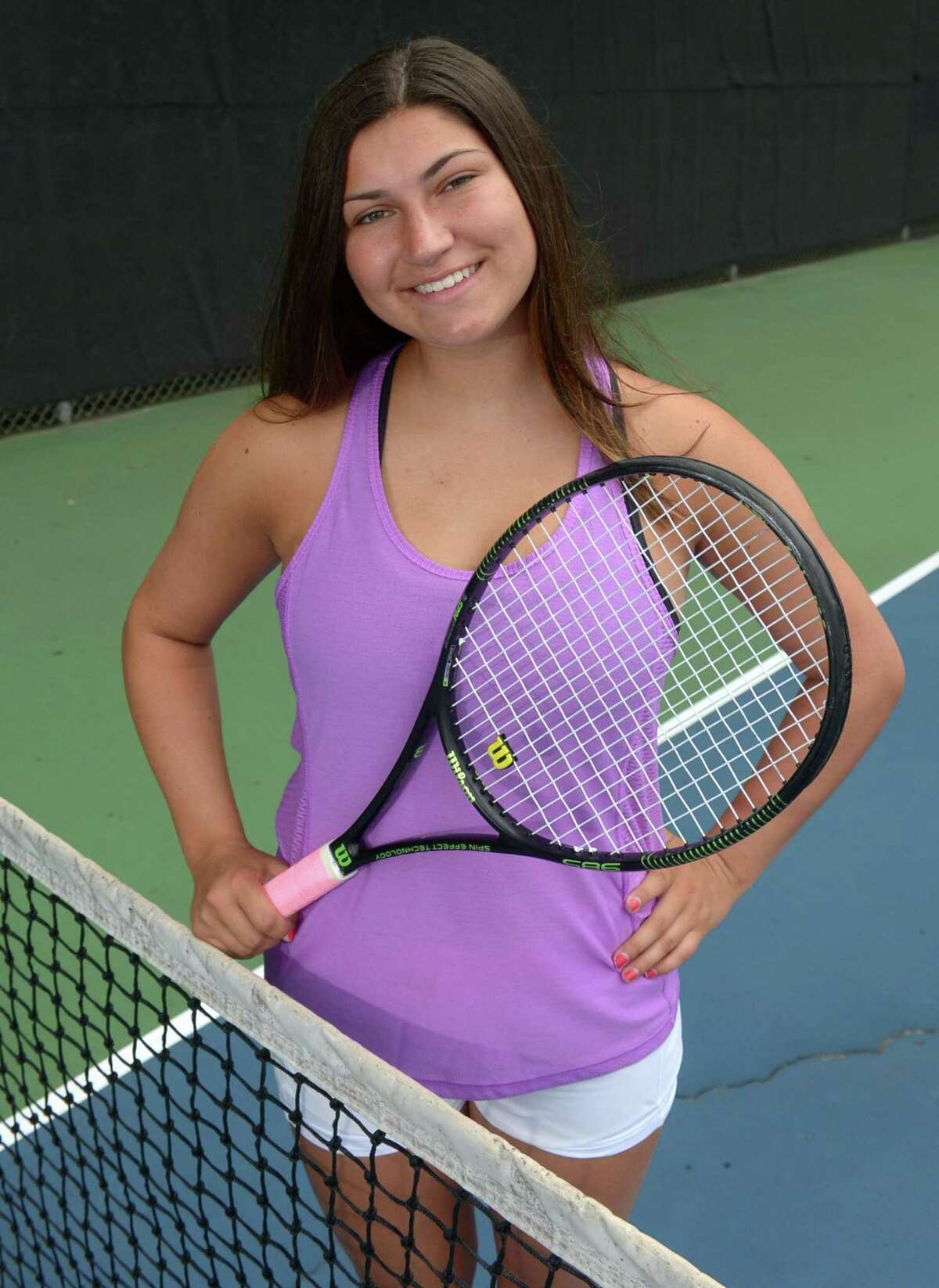Weston High graduate Cayla Koch, Hearst All-Stars Girls Tennis Player of the Year, Wednesday, July 12, 2017, at the Weston High School tennis courts in Weston, Conn.