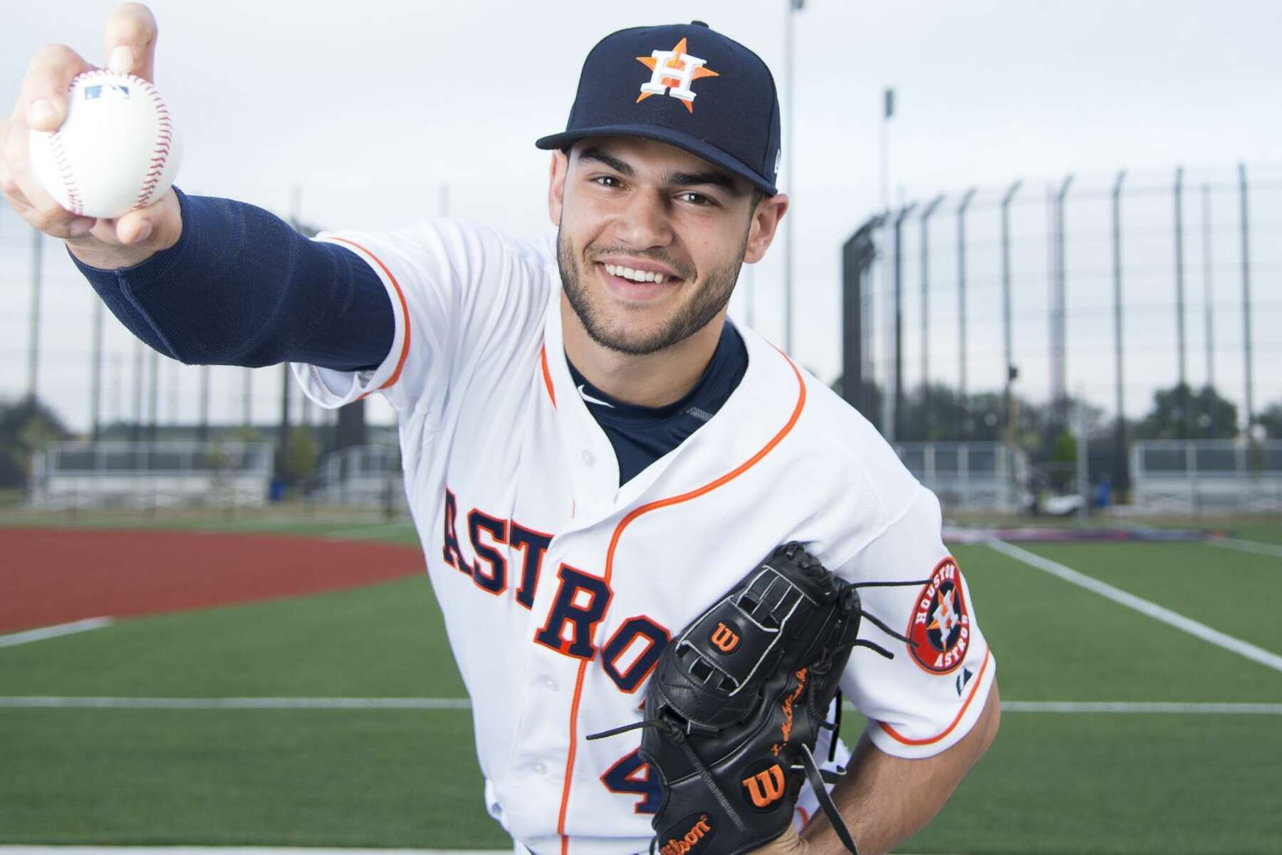 Houston Astros pitcher Lance McCullers Jr. (43) poses with fans