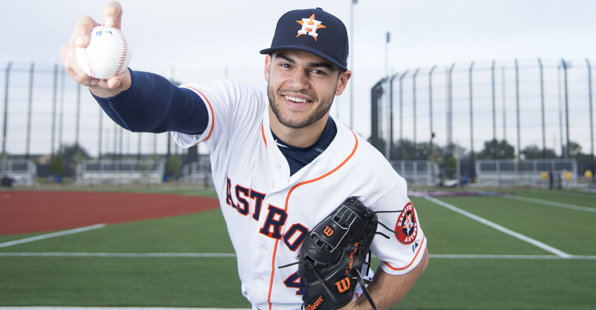 Houston Astros pitcher Lance McCullers Jr. (43) poses with fans