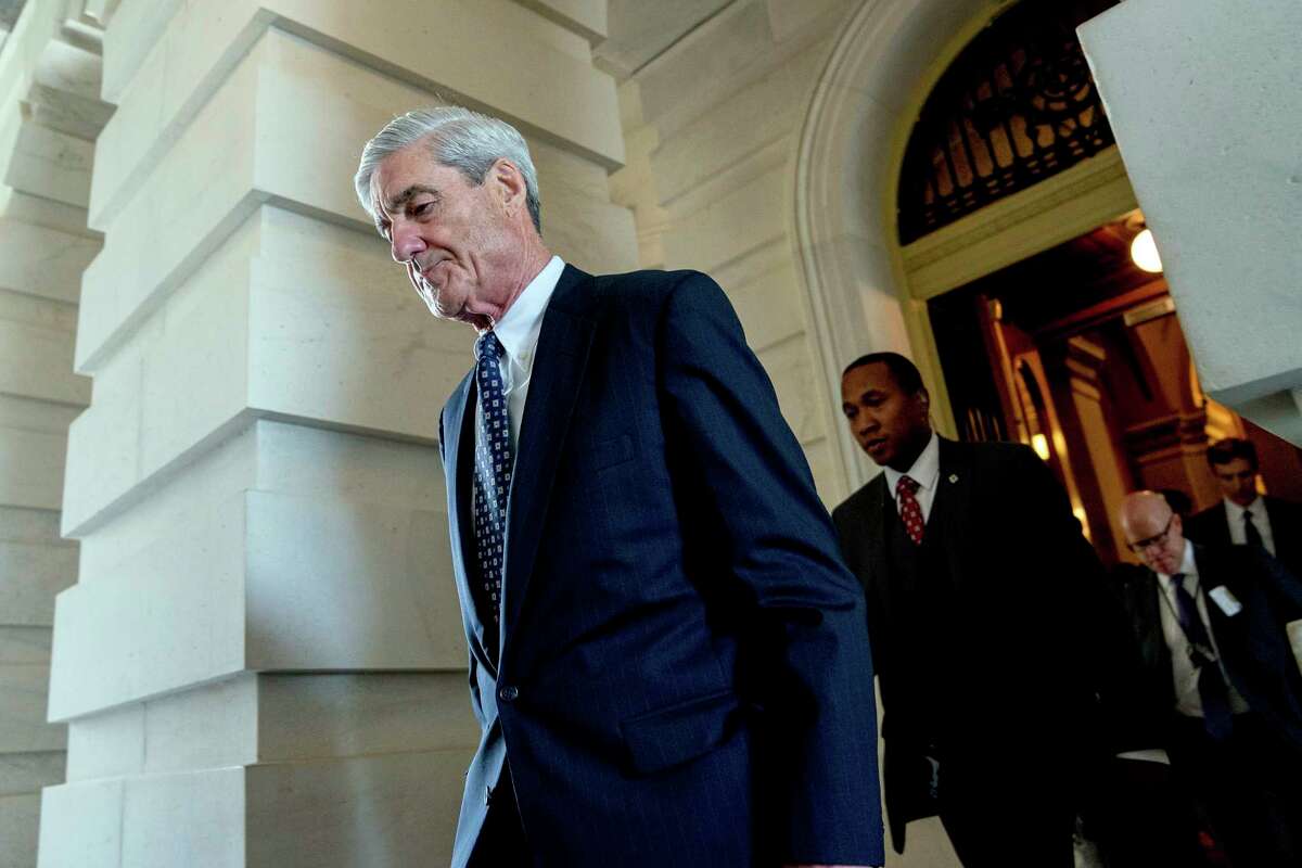 FILE - In this June 21, 2017, file photo, former FBI Director Robert Mueller, the special counsel probing Russian interference in the 2016 election, departs Capitol Hill following a closed door meeting in Washington. A 2001 Justice Department memo warned that no nation, including the United States, was immune from the threat posed by Russian organized crime. The special counsel investigation is bringing attention to Russian efforts to meddle in democratic processes, the type of intelligence gathering that in the past has relied on hired hackers. ItÂ?’s not clear how much the probe by Mueller will center on the criminal underbelly of Moscow, but heÂ?’s already picked some lawyers with experience confronting organized crime. (AP Photo/Andrew Harnik, File)