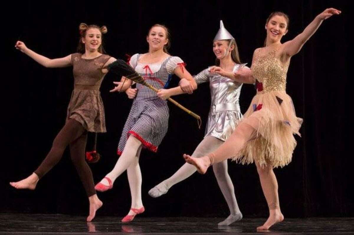 Dancers from left to right, Katie Lukens, Elizabeth Hawley, Anna Silva and Morgan Melendez take center stage.