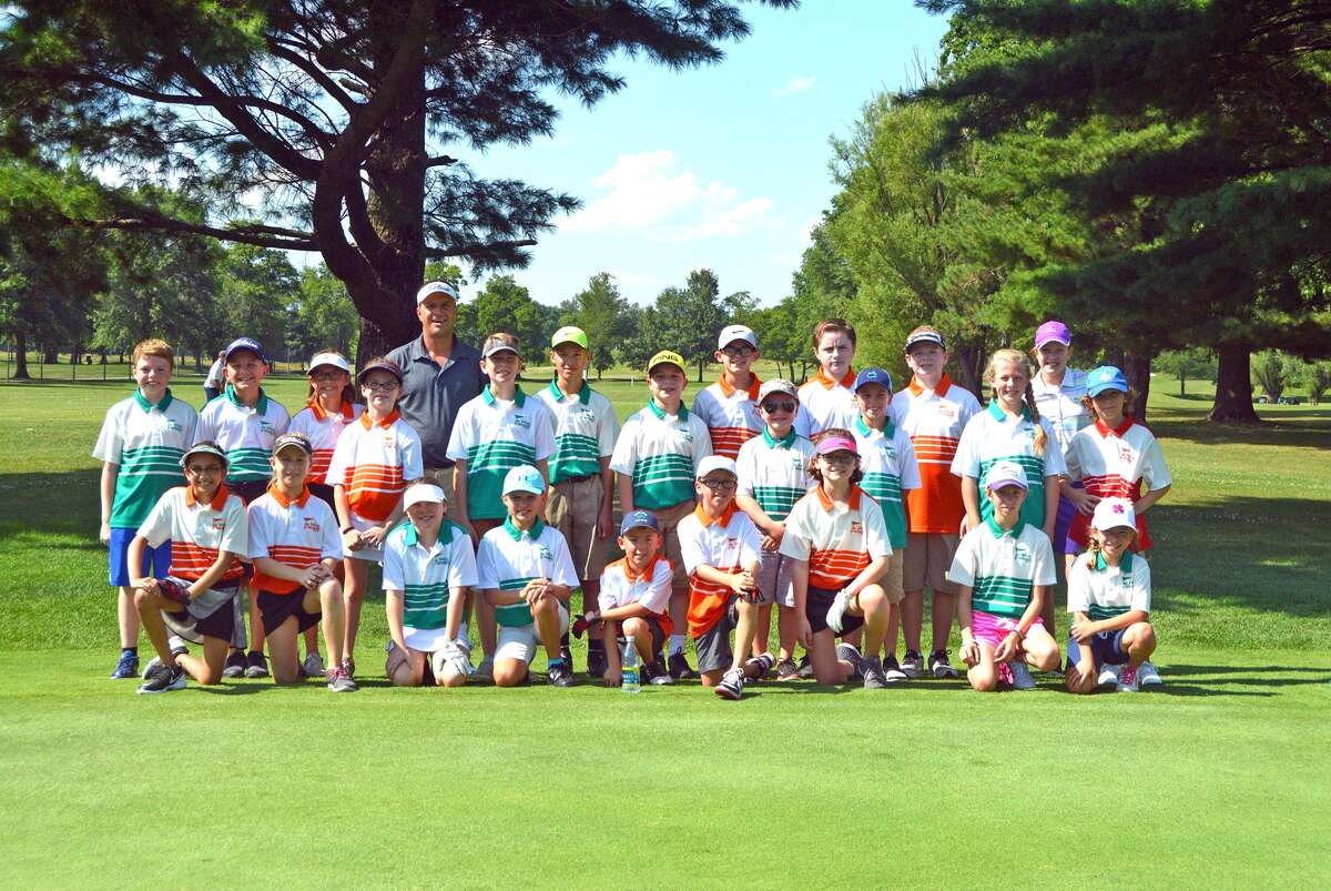 The members of the Oak Brook Golf Club’s PGA Junior Golf League team pose for a picture.