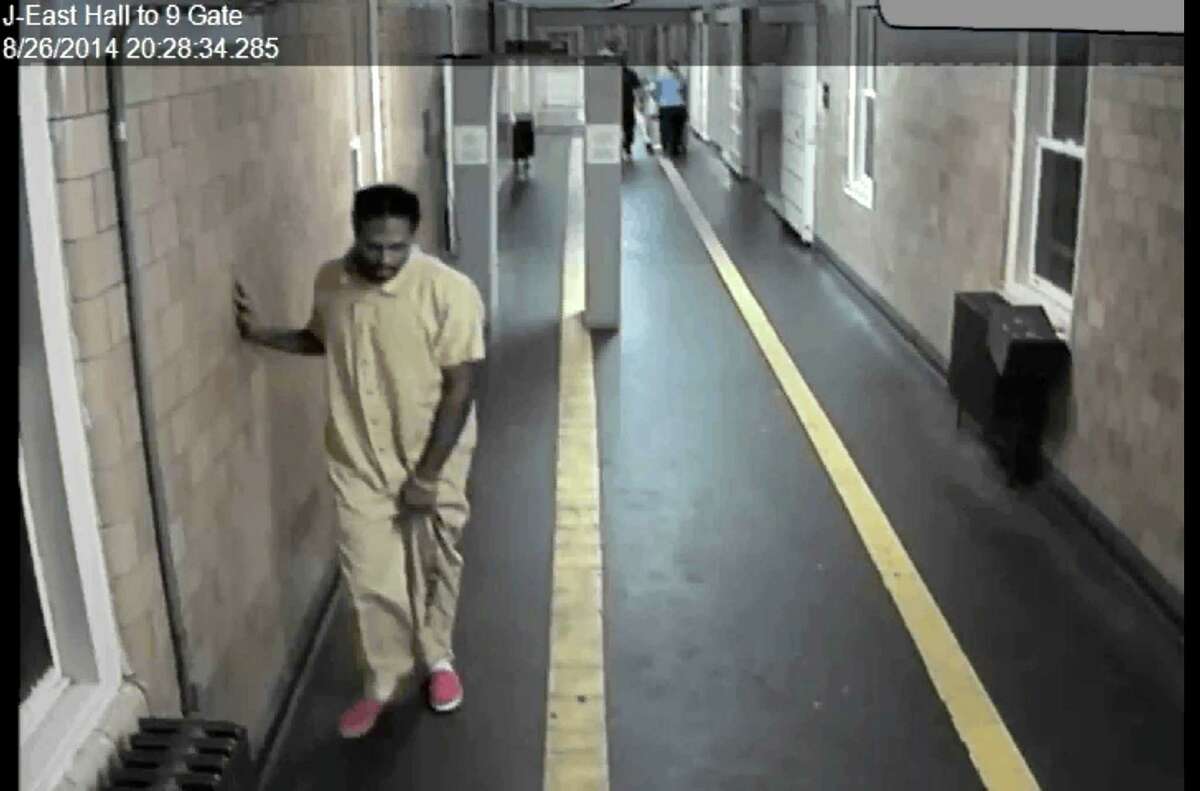 Mark Cannon, 24, staggers though the Albany County Correctional Facility after falling ill. The video was captured at 8:28 p.m. on Aug. 26, 2014.