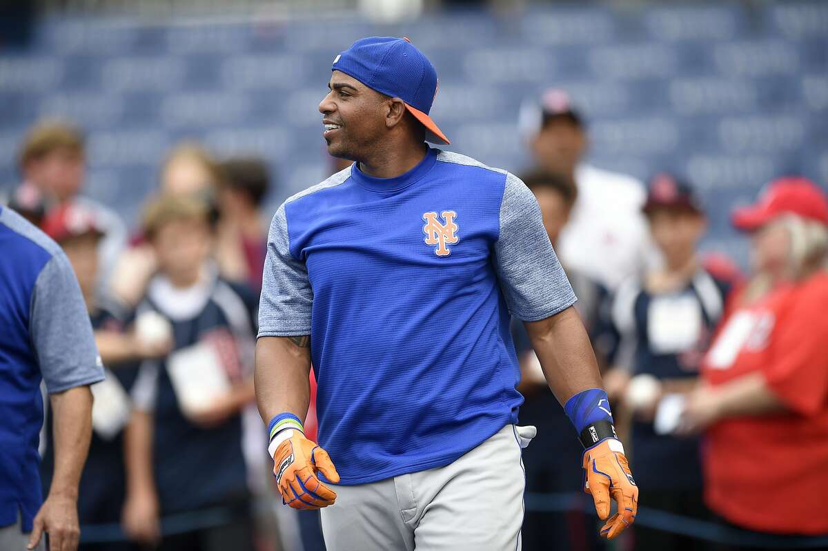 New York Mets' Yoenis Cespedes looks on during batting practice before a baseball game against the Washington Nationals, Wednesday, July 5, 2017, in Washington. (AP Photo/Nick Wass)