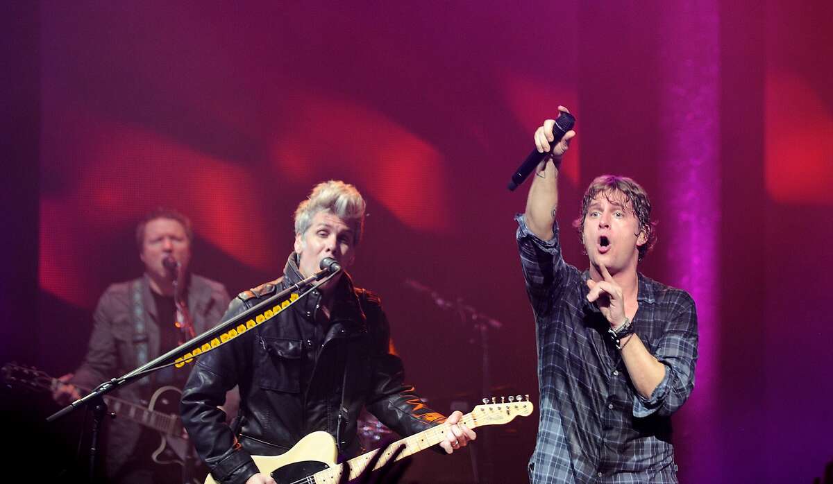 Kyle Cook and Rob Thomas of Matchbox Twenty perform on stage at The Roundhouse on September 19, 2012 in London, United Kingdom. (Photo by Gus Stewart/Redferns via Getty Images)
