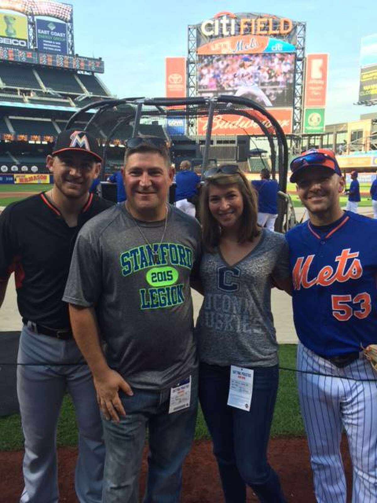 Stamford American Legion's Chris Sabia with his wife Emma at Citi Field in September the day before he began cancer treatments. They are joined by Mets bullpen catcher Dave Racaniello, the best man at Sabia's and Marlins cactehr Jeff Mathis, Sabia's cousin.