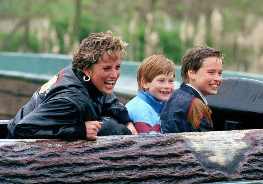 Princess Diana Wasn T Forgotten At The Royal Wedding Her Sons Still Princess Diana Enjoys A Theme Park Ride With Sons Harry Also At Right And