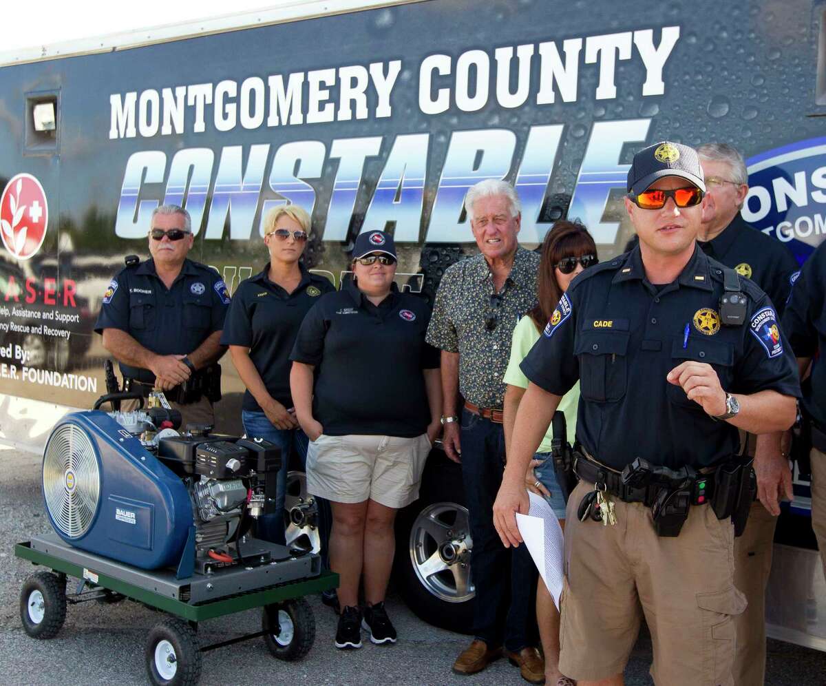 Lt. Tim Cade with the Montgomery County Precinct 1 Constable's Office speaks near Lake Conroe during a press conference, Thursday in Conroe.