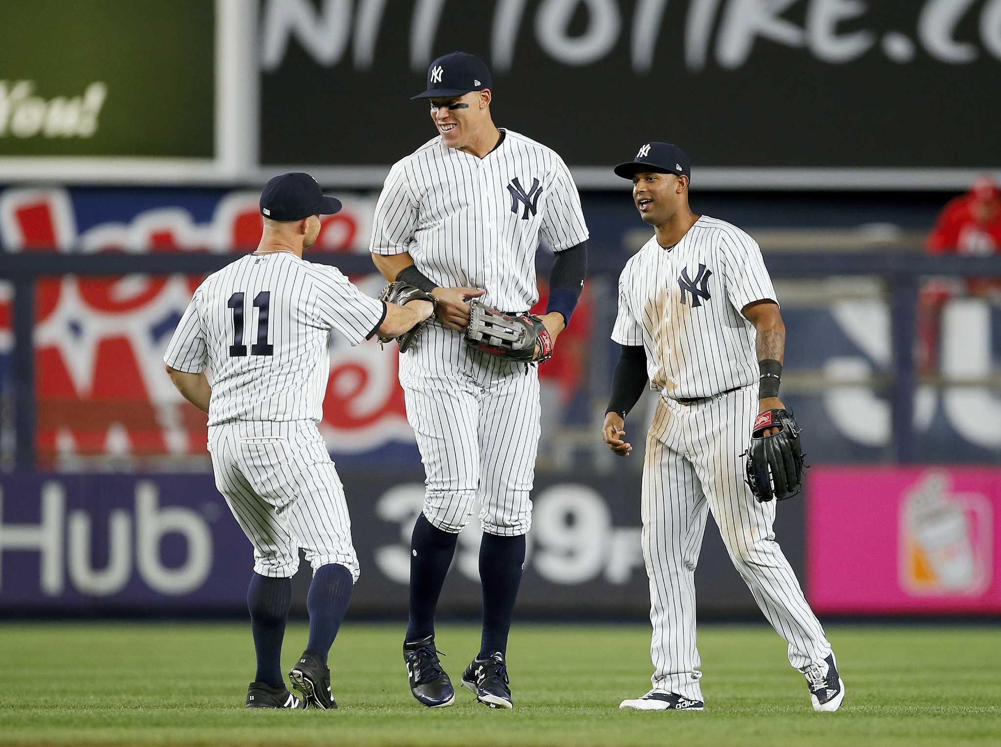 Which football scholarships did Yankees' Aaron Judge turn down