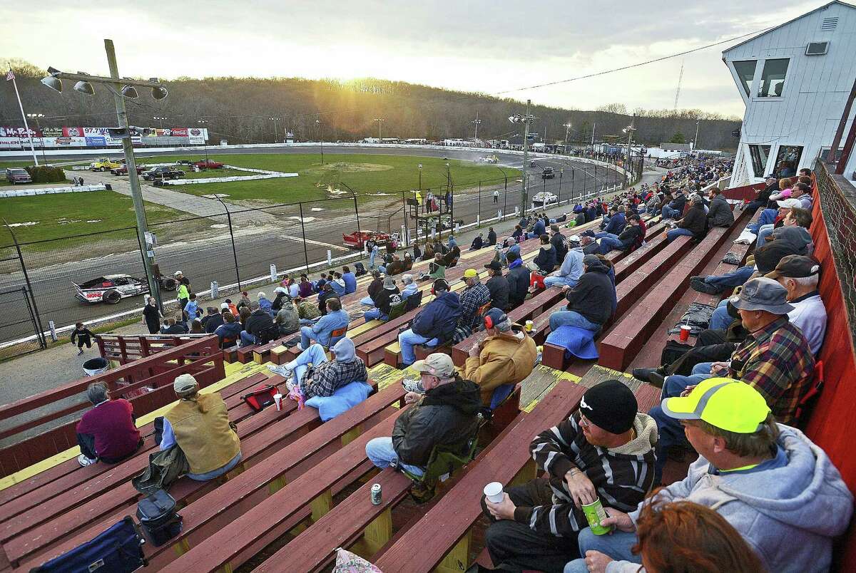 In this 2014 photo, fans watch a race at the New London Waterford Speedbowl in Waterford.