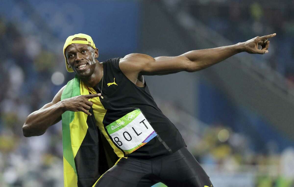 Jamaica’s Usain Bolt celebrates winning the men’s 100-meter final during the athletics competitions of the 2016 Summer Olympics at the Olympic stadium in Rio de Janeiro, Brazil on Aug. 14, 2016.