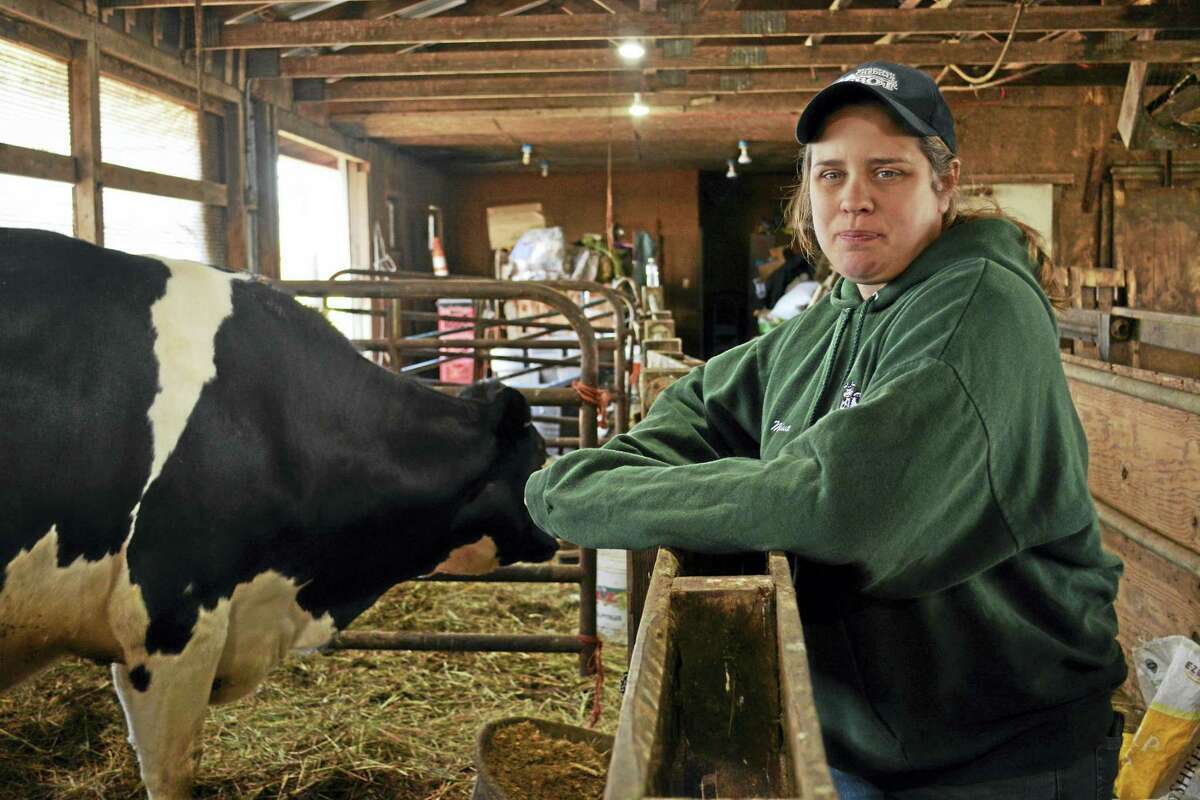 Melissa Greenbacker-Dziurgot of Greenbacker’s Brookfield dairy Farm in Durham, is one of the 39 percent of women who manage farms in Connecticut. She runs the the 411-acre plot with help from her father, uncle, mother and husband.