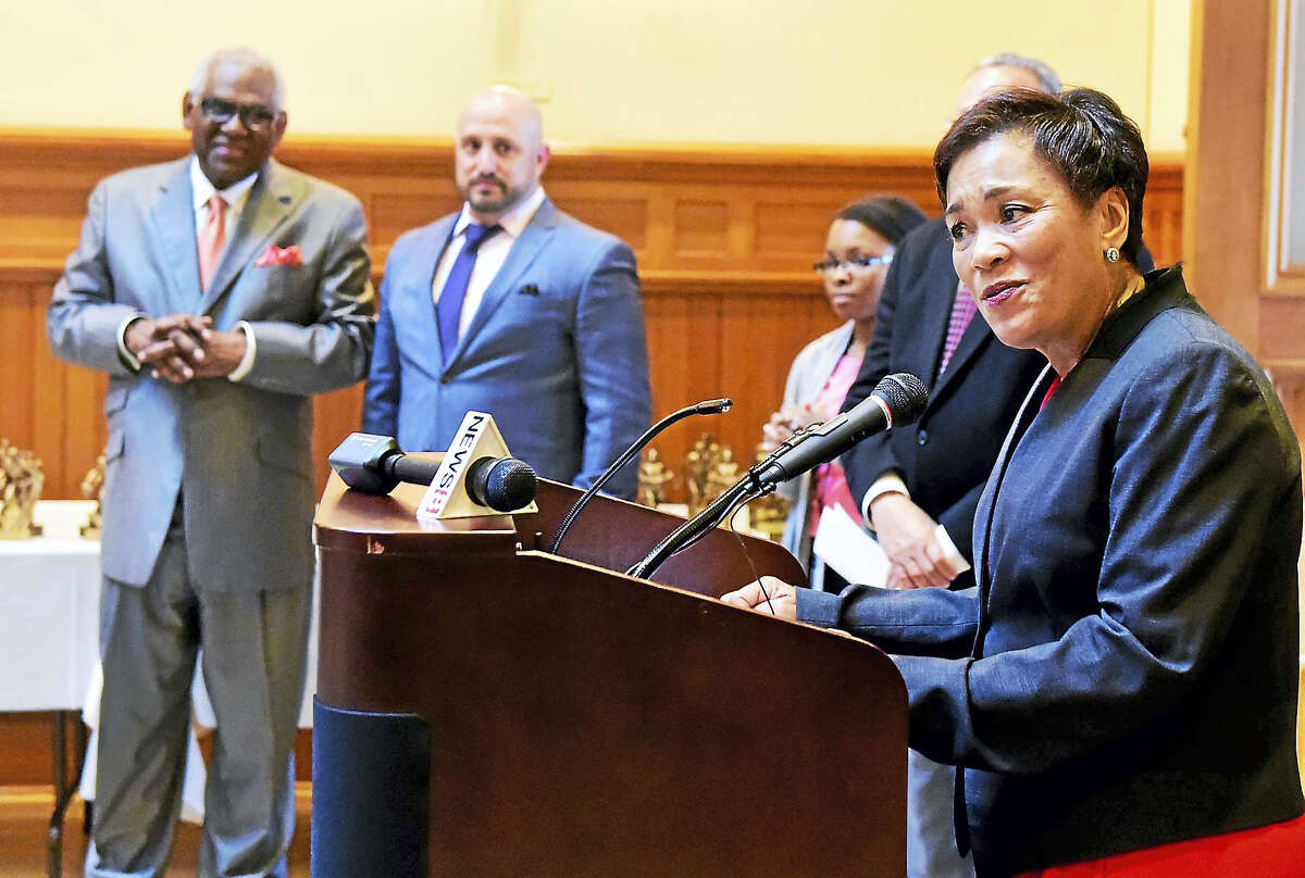 New Haven Mayor Toni N. Harp welcomes members of the James Hillhouse High School championship girls track, boys basketball and boys track teams during a celebration at City Hall.