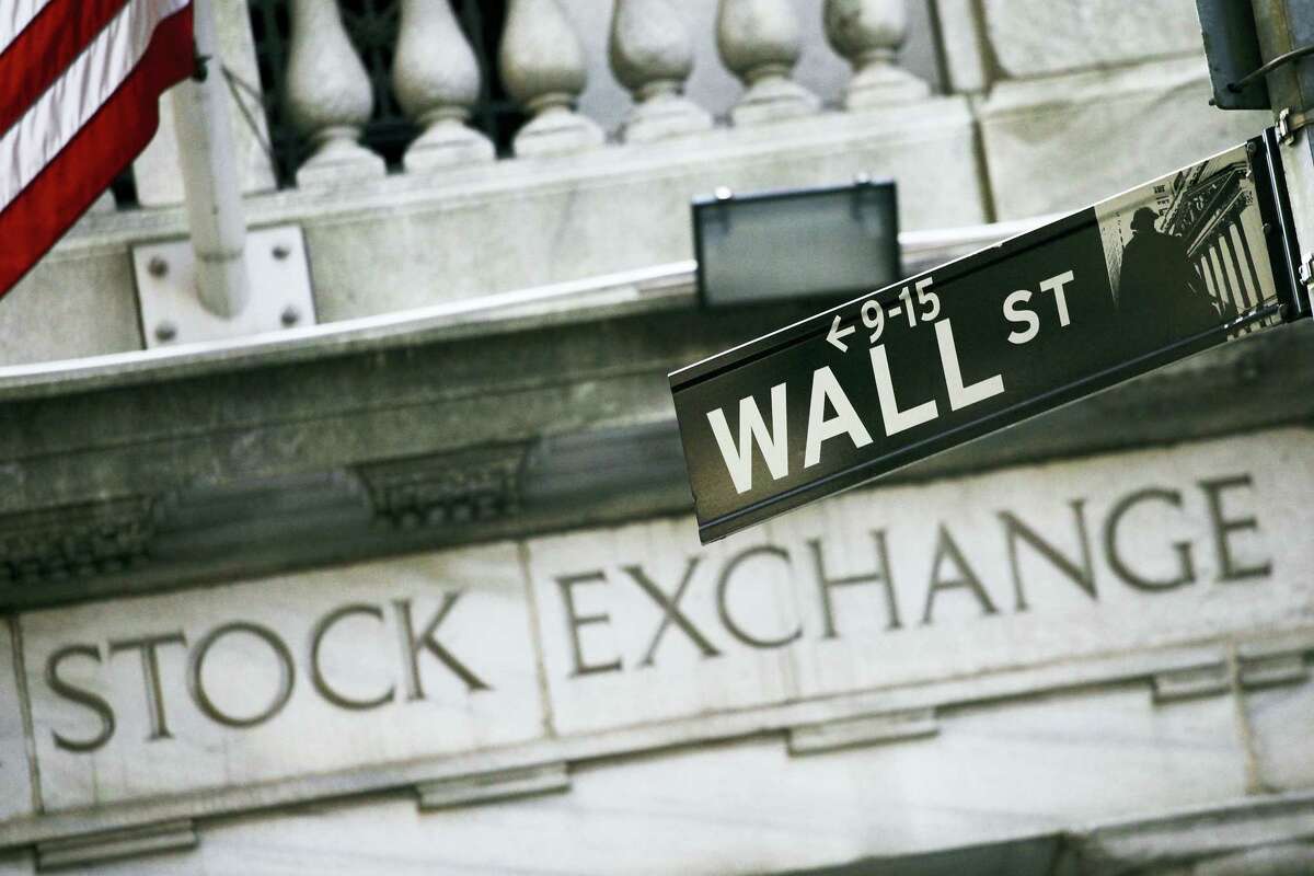 A Wall Street street sign outside the New York Stock Exchange.
