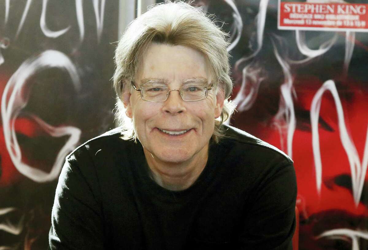 In this Nov. 13, 2013, file photo, author Stephen King poses for the cameras, during a promotional tour in Paris. King wrote on Twitter on May 23, 2017, that Islamic State is a “rogue cult” and that the group’s bombings will eventually lead to its undoing.