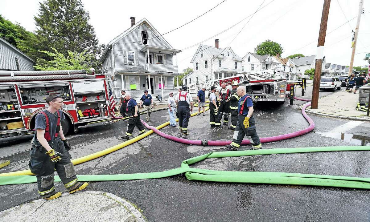 The aftermath of a morning fire at 17 Hubbell Ave. in Ansonia Tuesday.