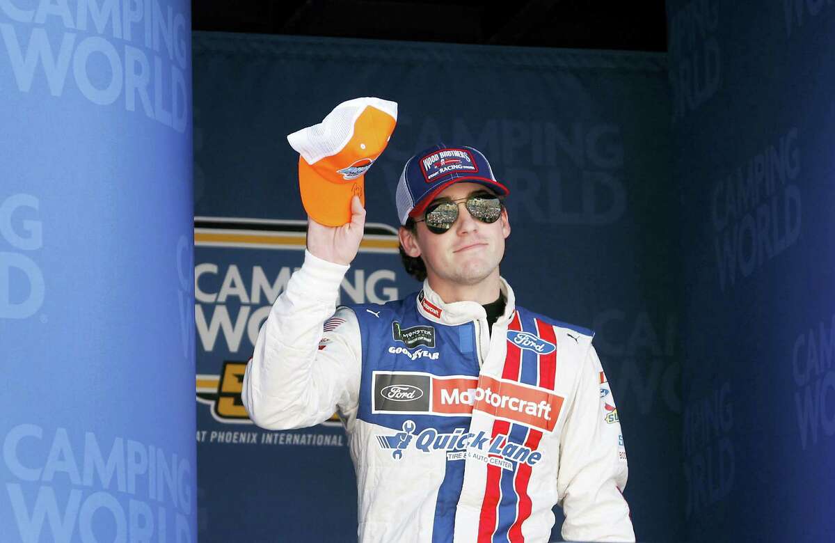 Ryan Blaney waves to the crowd during driver introductions at Phoenix International Raceway last week.