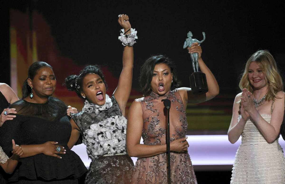 Octavia Spencer, from left, Janelle Monae, Taraji P. Henson, and Kirsten Dunst accept the award for outstanding performance by a cast in a motion picture for “Hidden Figures” at the 23rd annual Screen Actors Guild Awards at the Shrine Auditorium & Expo Hall on Sunday, Jan. 29, 2017, in Los Angeles. (Photo by Chris Pizzello/Invision/AP)
