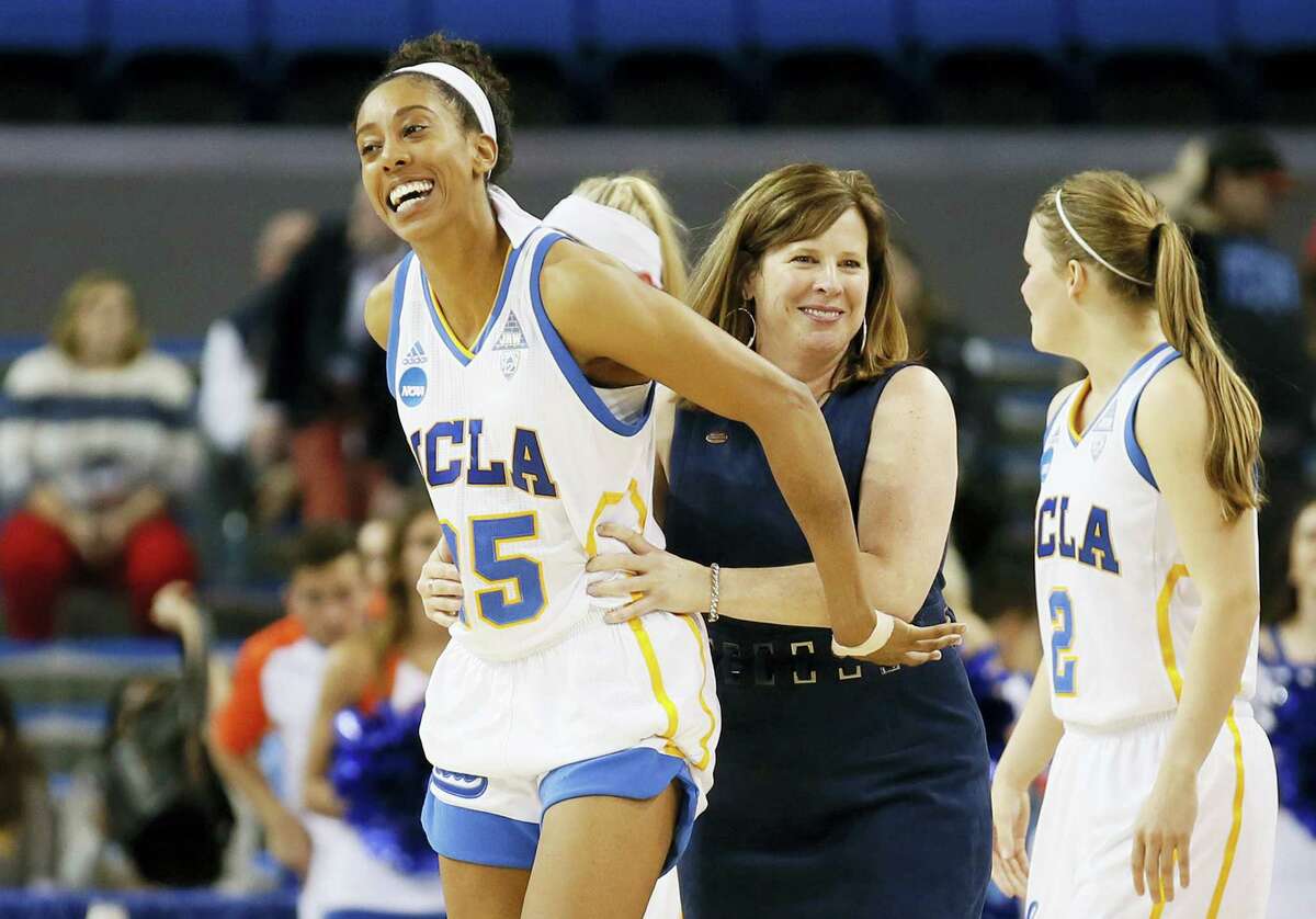 UCLA forward Monique Billings, left, and coach Cori Close, right, smile after UCLA defeated Boise State in an NCAA Tournament first-round game in Los Angeles.