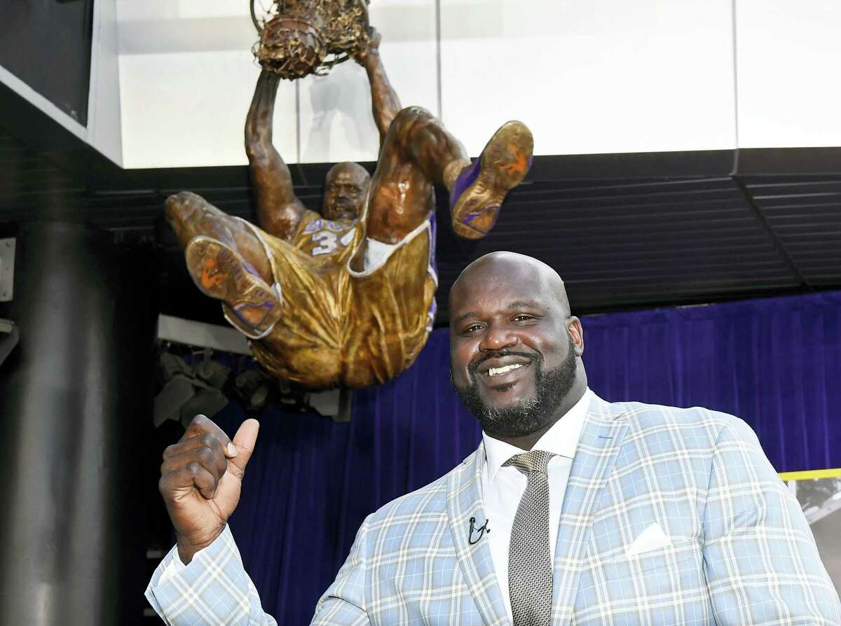 Shaquille O’Neal poses after the unveiling of a statue of him in front of Staples Center on Friday.